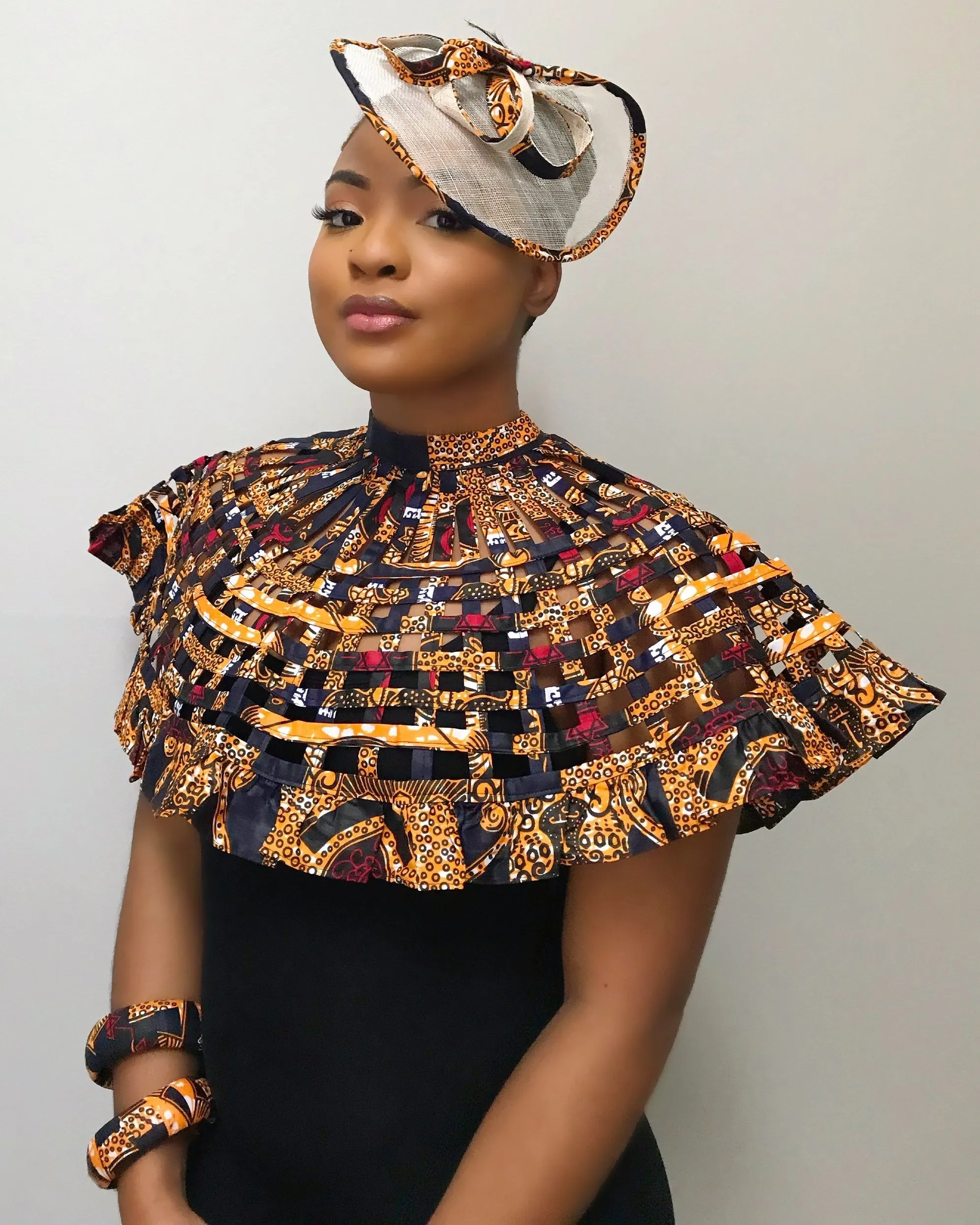 Bessa African Print Fascinator Hat - Navy blue / Orange
